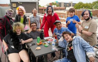 Rainbow Alley youth attend a drag workshop during Summer Academy