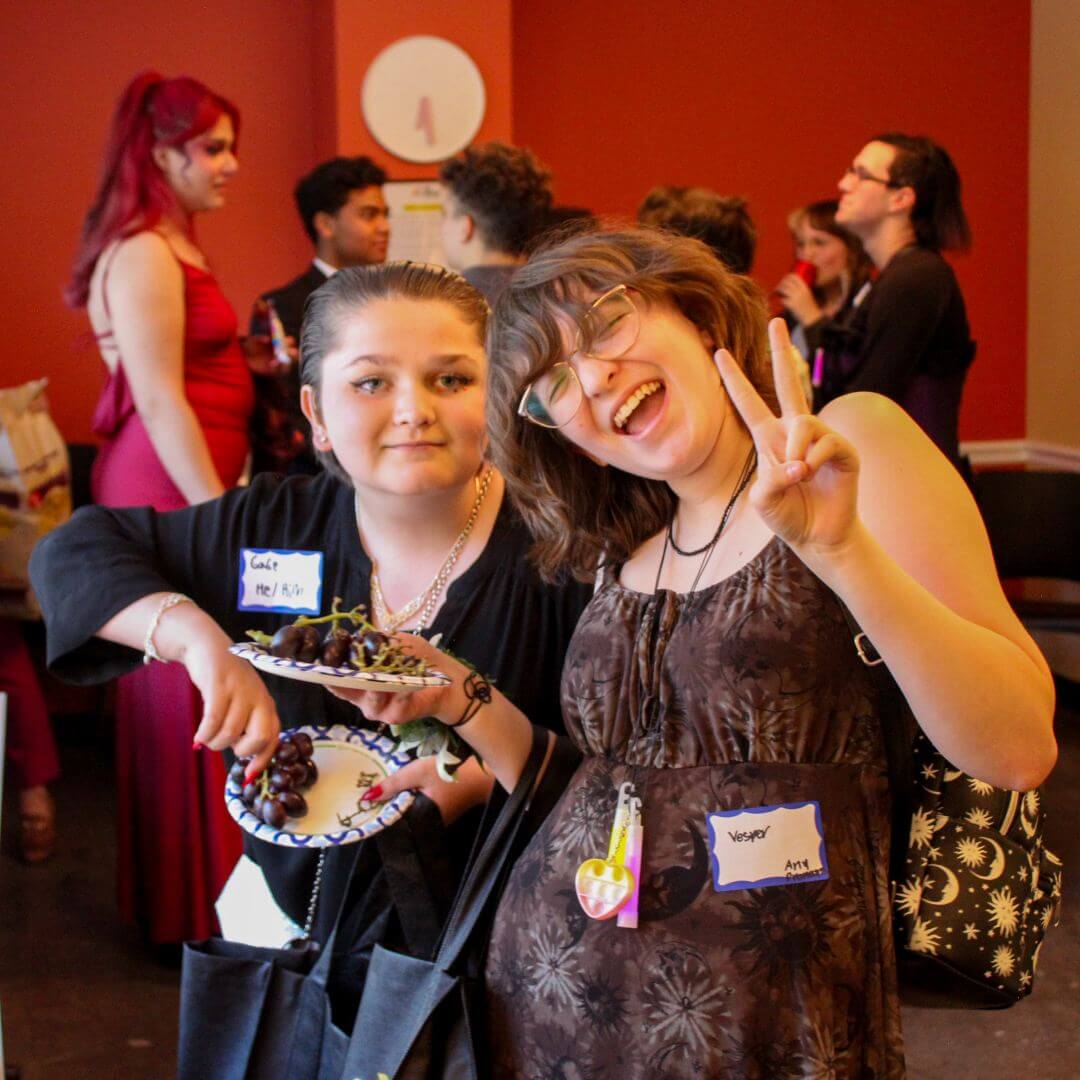 Two Rainbow Alley members pose for the camera during Queer Prom