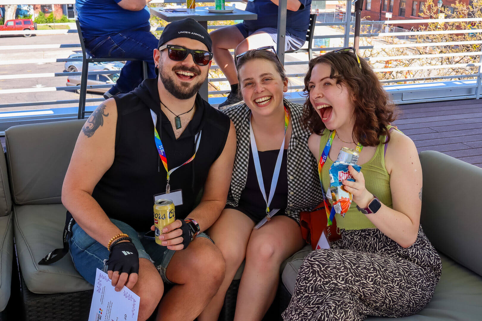 2025-05-CheersToVolunteers-PhotoByAshleySchoenbauer-51 Three volunteers pose for a photo at an event